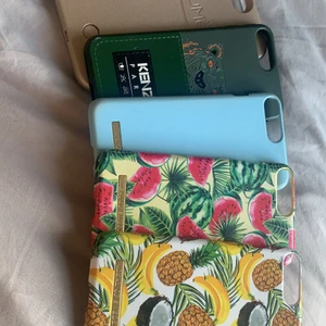 iPhone 7 & 8+ skal - iPhone 7&8 + skal. Okej skick på alla. 50kr per skal förutom det längst till vänster som har lampop på skalet som man kan sätta igång, 30kr. 3 ifrån ideal of sweden, ett kenzo skal & ett skal som lyser