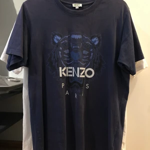 Kenzo tshirt - strl S - hej! säljer min gammla Kenzo t-shirt i storlek S. vid frågor eller funderingar skicka gärna ett medelande :) kolla in min profil för har liknande kläder där, kan komma på något rabatt-packet för alla kläder också!