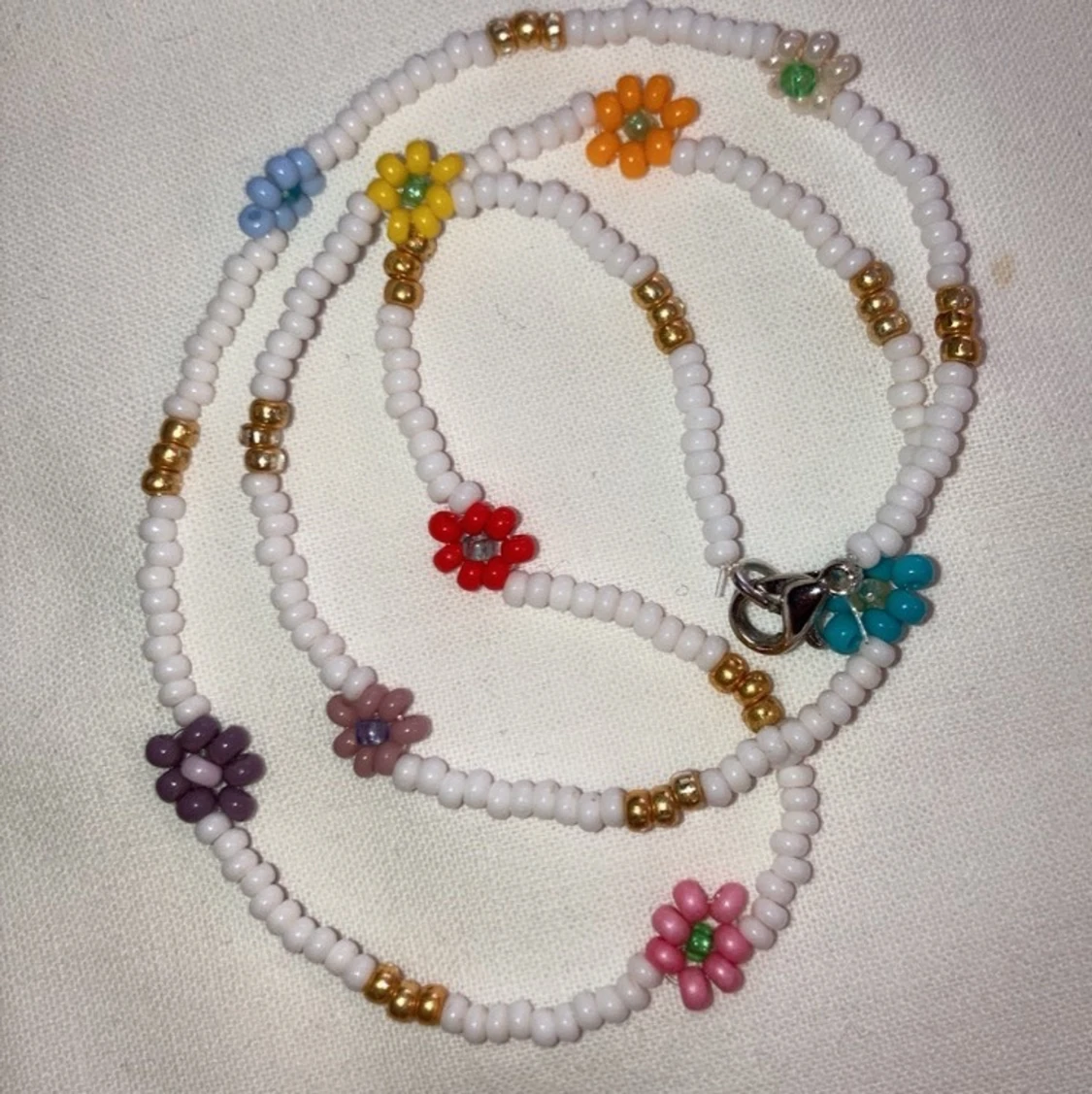 Halsband blommor - 91