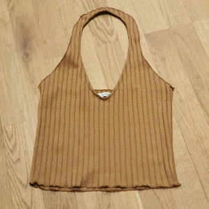 Ribbed openback knit top - Top in summery knit rib. Open back. In camel color. Can send a picture while wearing, just ask. 