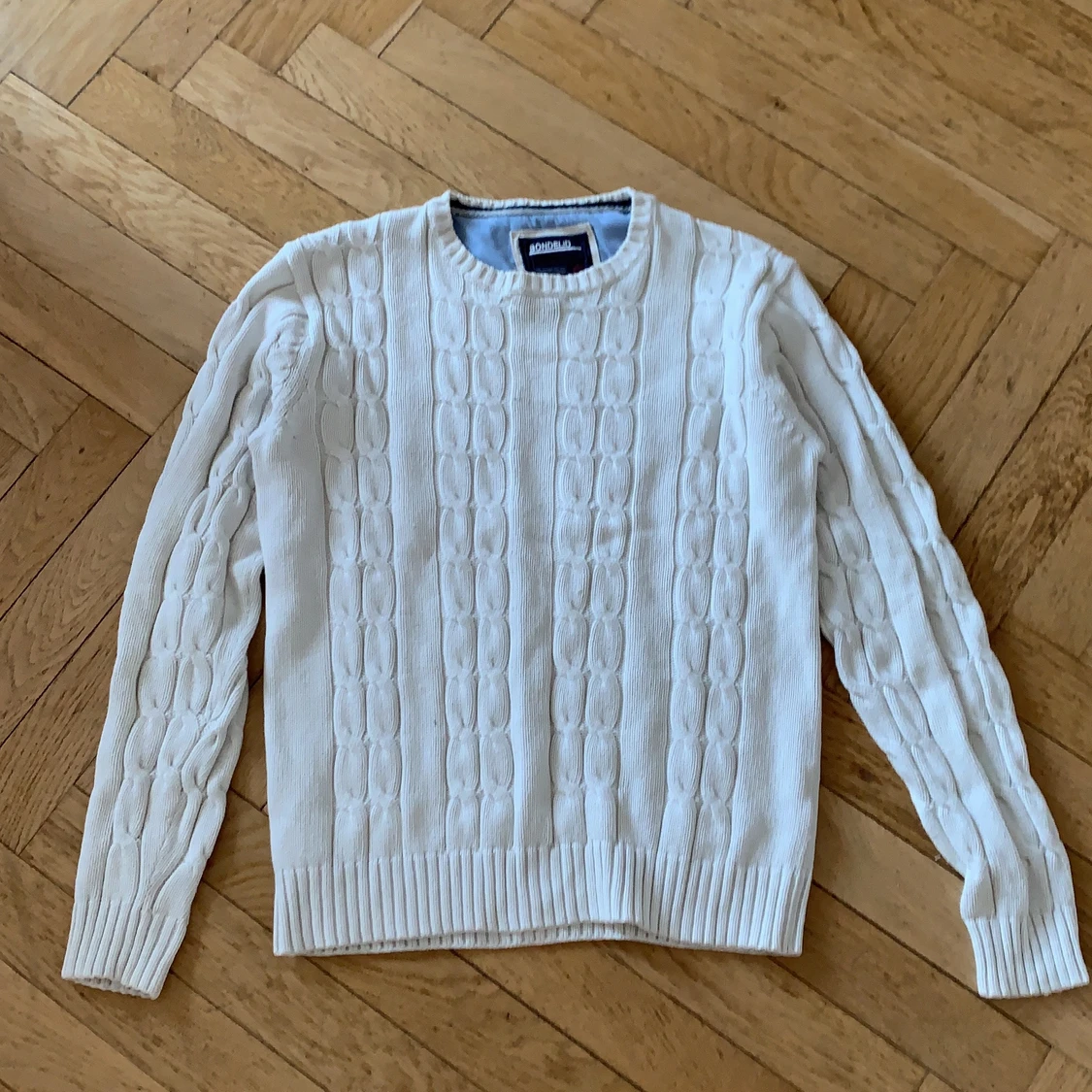 Stickad bondelid sweatshirt