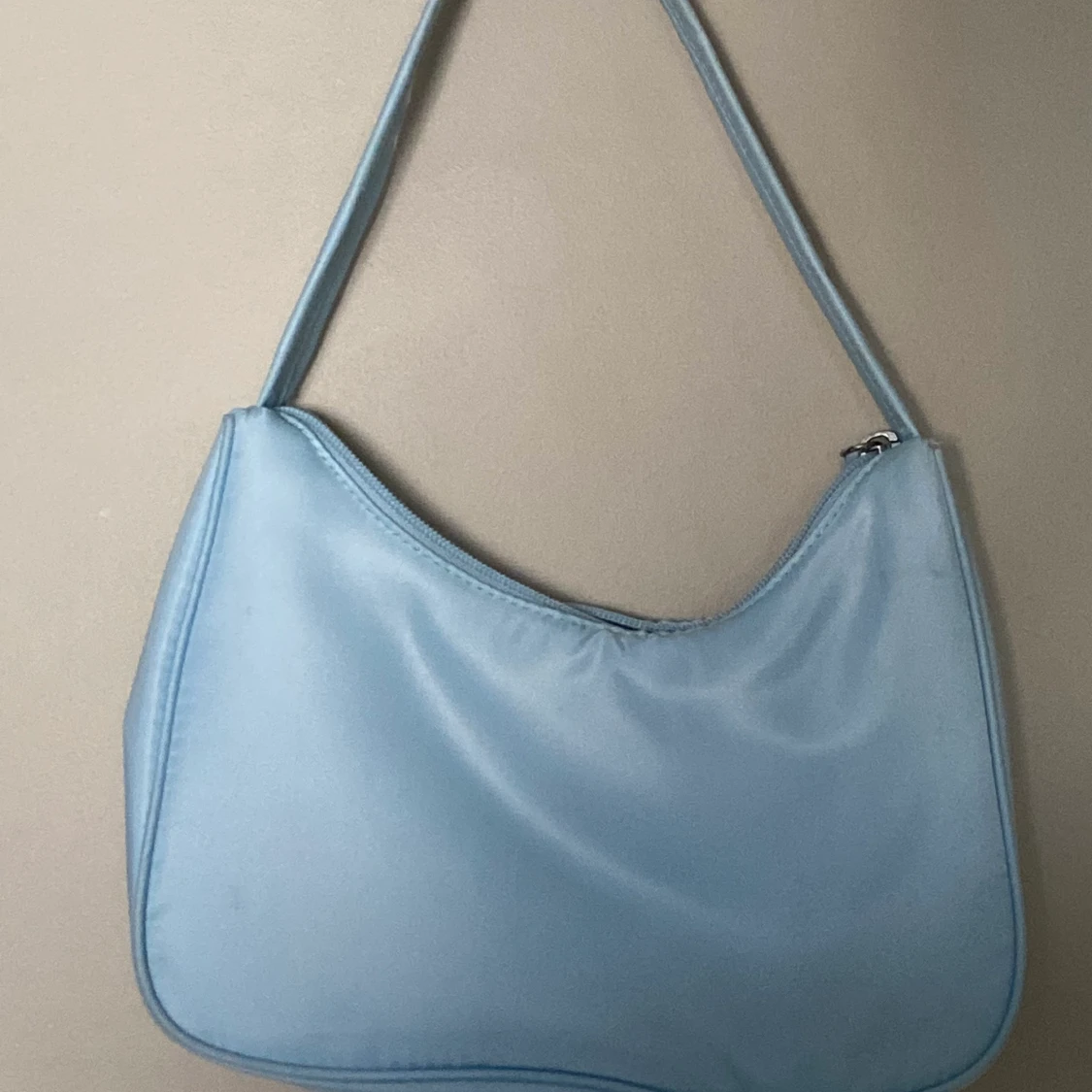 Ljusblå baguette bag 