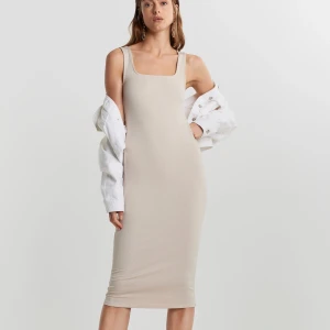 Niki rib dress från Gina Tricot  - Snygg ribbad långklänning från Gina Tricot som inte kommer till användning. Storlek S. 