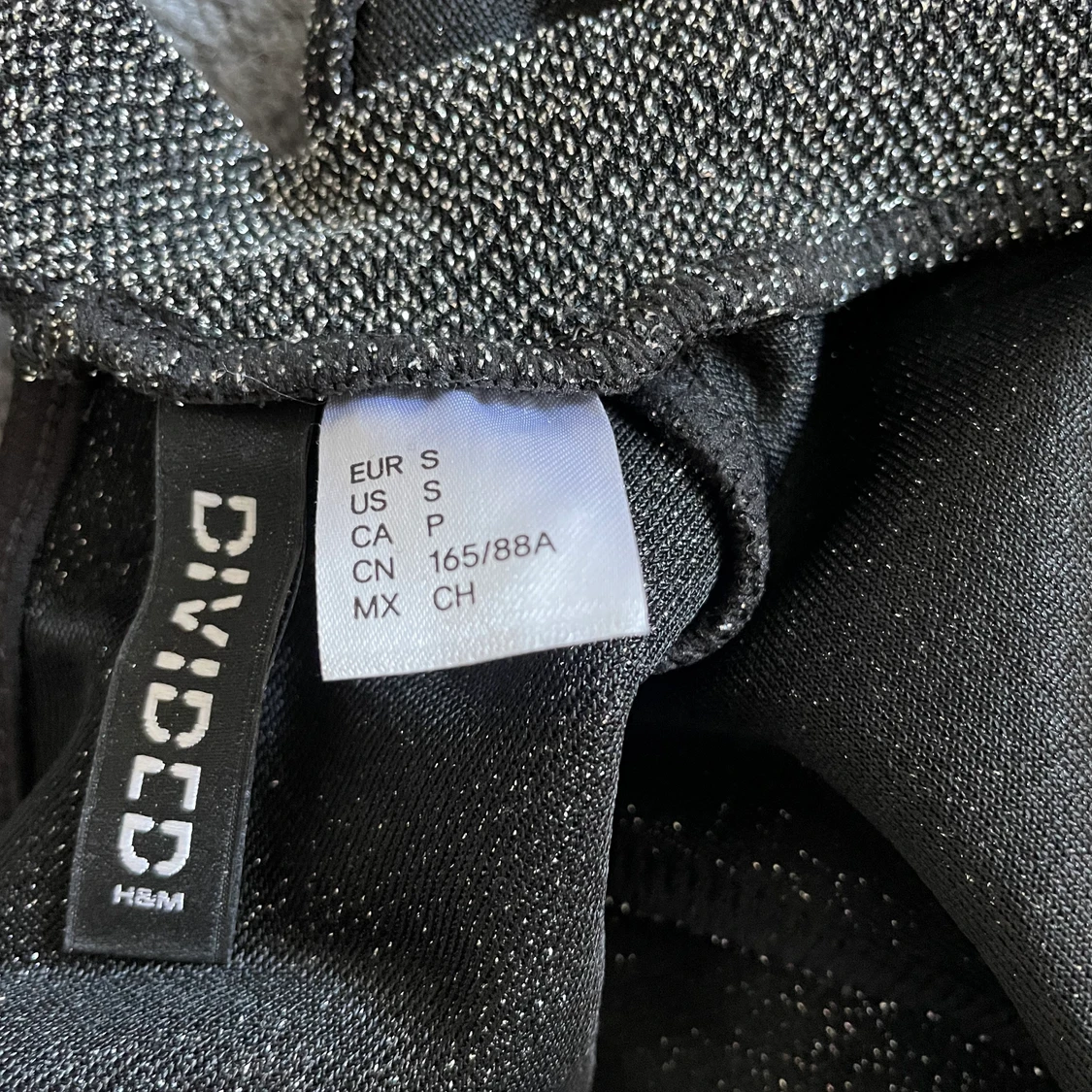 H&M glittrig body med öppen rygg - 91