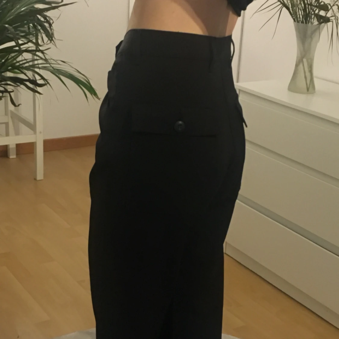 Svarta byxor med bakfickor - 91