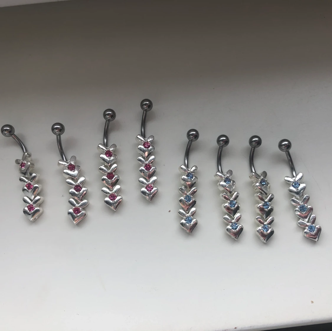 REA navelpiercing  - 90