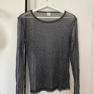 Glitter meshtröja - Glittrig tröja i mesh från Gina 