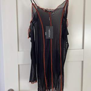 kort klänning i mesh från PLT, aldrig använd strl 38
