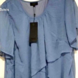 Klänning  - Från Zhenzi storlek L . Sval o skön viscose . Har blivit för stor för mej . 