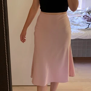 Rosa kjol - Trendig kjol från NA-KD. Aldrig använd. Storlek 38.