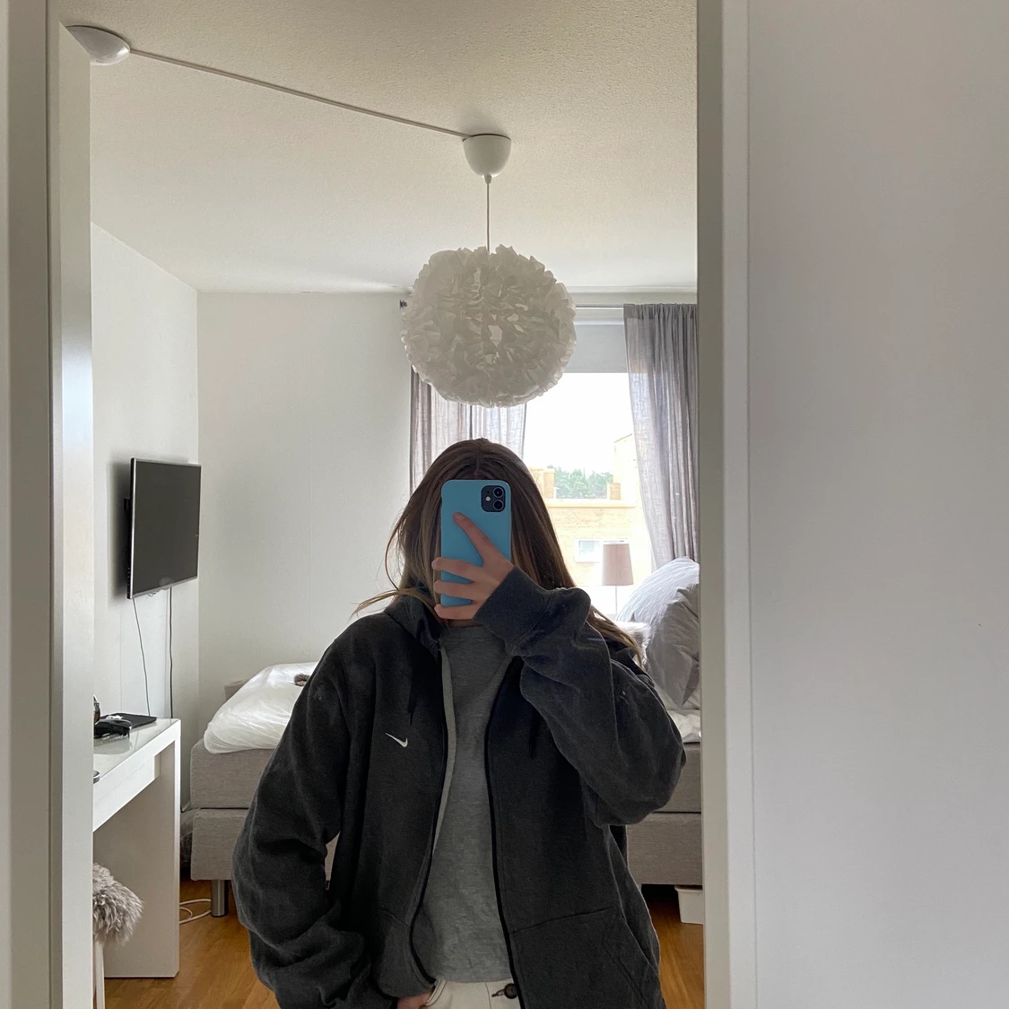 Nike hoddie i storlek L (passar M) - 90