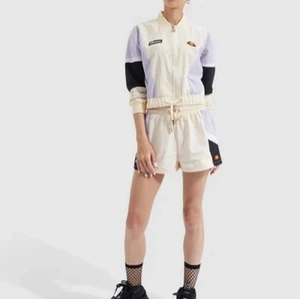 Ellesse track jacket + shorts EU34 - Matching Ellesse Shiaro Track Jacket and matching  Poscuro Shorts in size 34, colour Beige. Brand new, never worn, with tags. 