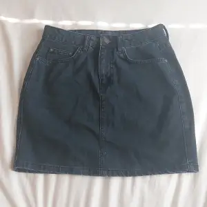 Black jeans skirt from Nelly. Short.