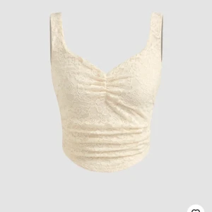 Topp i spets - Provad men oanvänd.