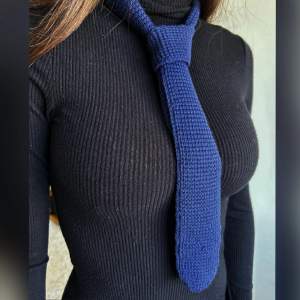 Elegant crocheted tie made by me.  Color: Navy Blue Material: Cotton yarn