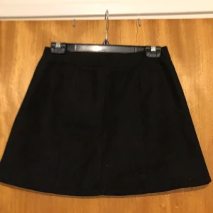 Mocca imitation kjol - Typ använd 1gång 