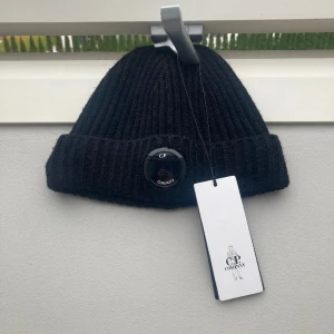 Cp company mössa - En mössa perfekt till vinter  Sänker pris vid snabb affär👌🏼