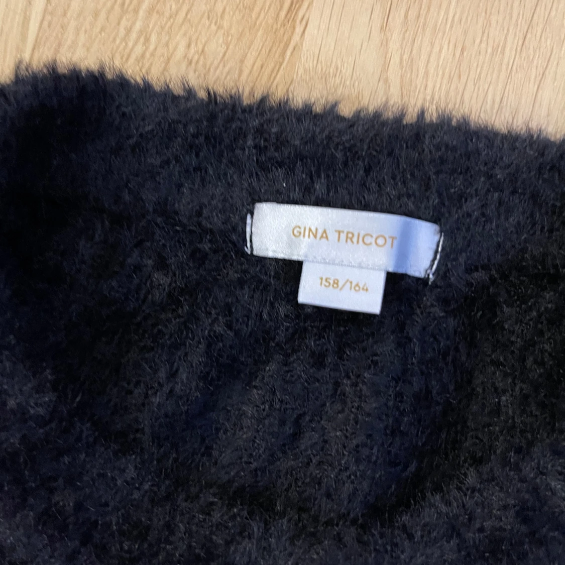 Svart flufftröja - 90