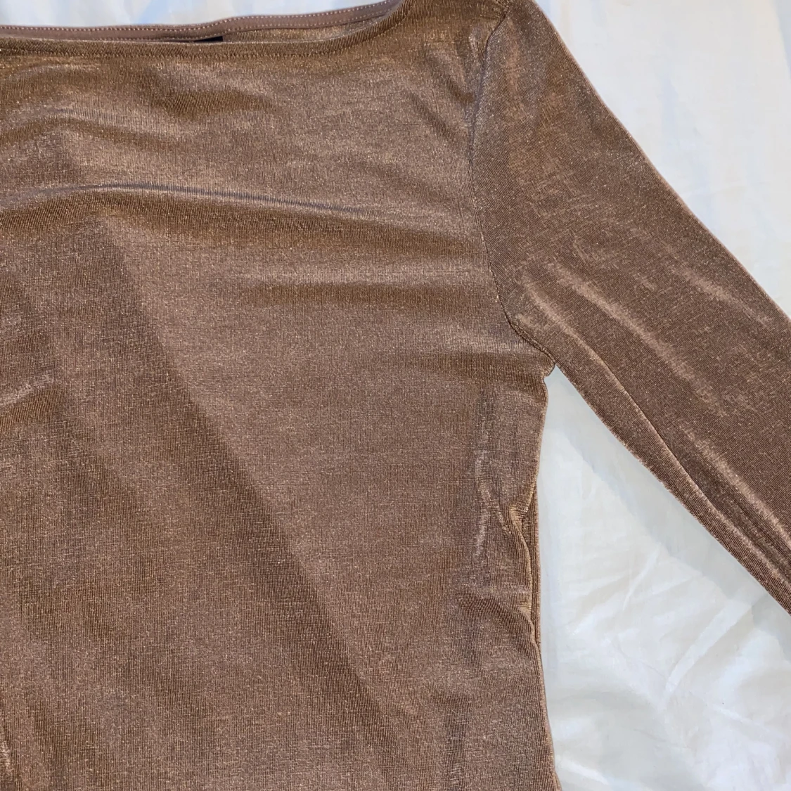 Glittrig långärmad tröja