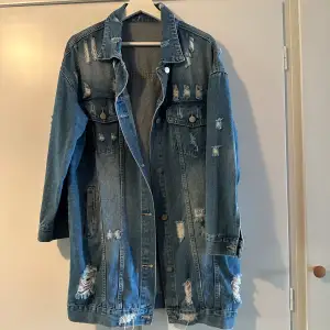 Ripped oversized denim jacket. Only used a few times, as good as new.