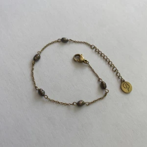 Edblad armband  - Jätte fint Edblad armband me mörka pärlor , säljs inte längre 