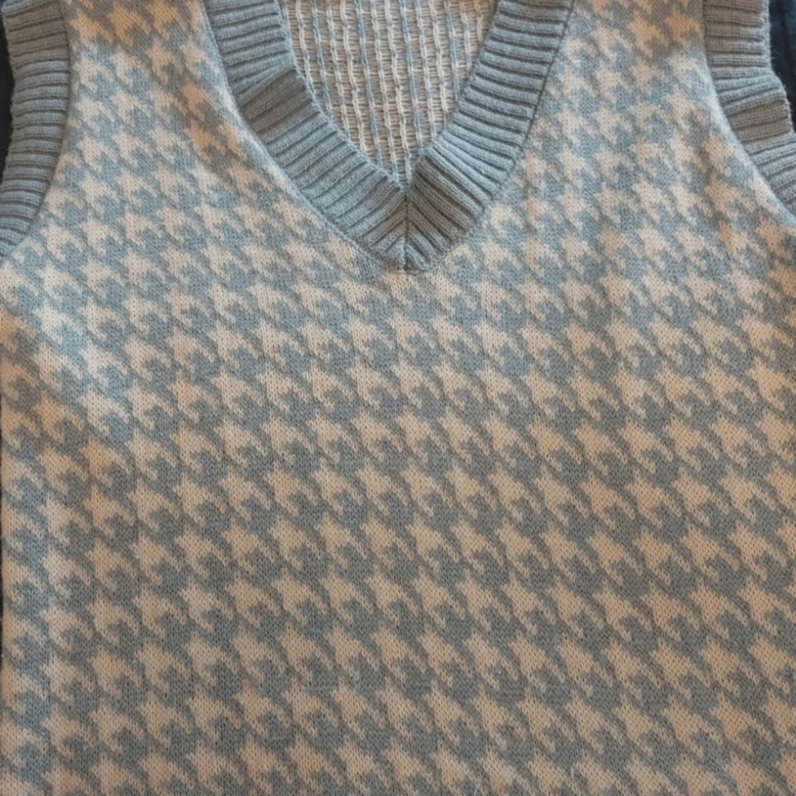 Blå sweater vest