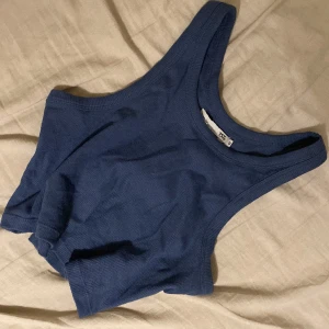 Tanktop  - Fin tanktop från lager 157. Säljer då den är för stor, använd en gång. Hör av dig vid frågor eller intresse💗