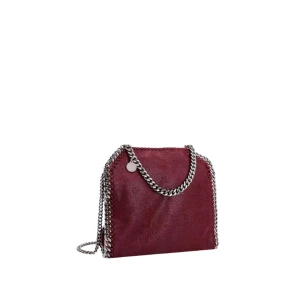 Fallabella tiny - Säljer min älskade stella mccartney väska, fallabella tiny tote i röd. Knappt använd då jag har andra väskor. Köpt på plick så kan ej försäkra äkthet, har även råkat slarva bort cirkelloggan på utsidan därav det billiga priset.