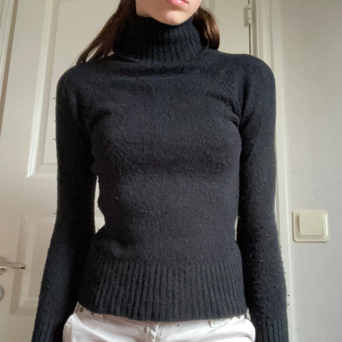 Svart stickad tröja