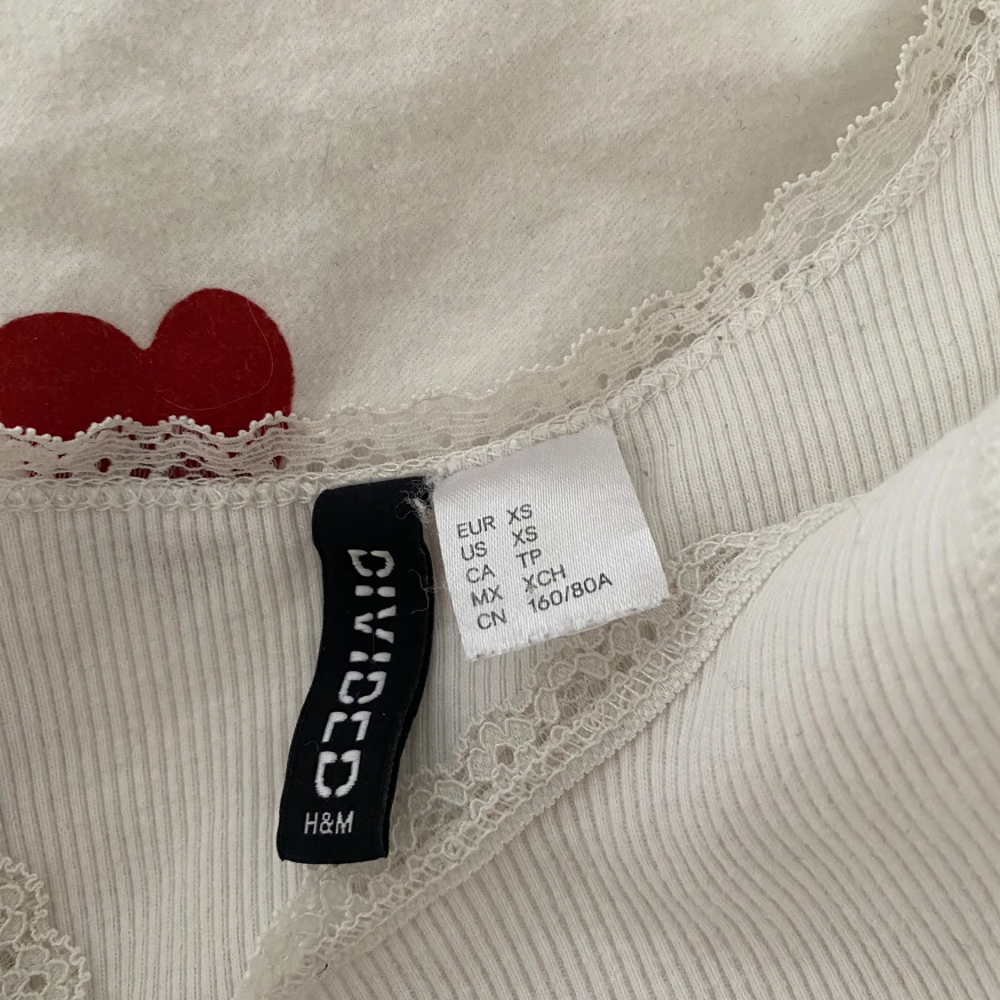 Spetslinne med rosett  - 92