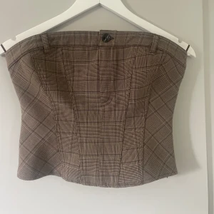 Korsett topp - Cool korsett topp med dragkedja detalj