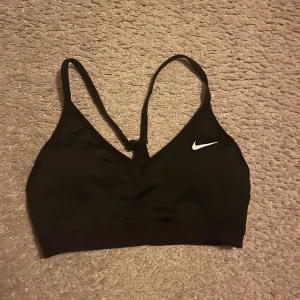 Sport-bh Nike  - Svart sport-bh från Nike. Storlek xs! Bra skick 