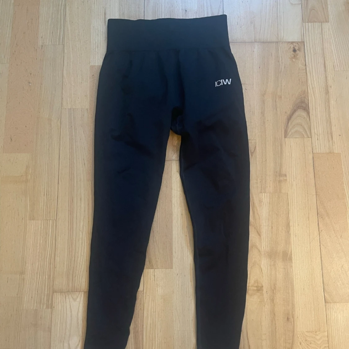 Oanvända ICIW träningstights 