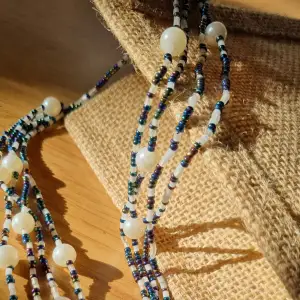 Long strand of mix beads and pearls that can signify your uniqueness and express yourself in style.   Handmade/Handcrafted.  3way fashion accessory necklace,bracelet and anklet.  Brandnew without tag.