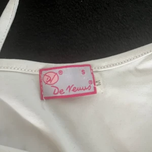 Stretchig linne - Stretchig vitt linne i storlek S