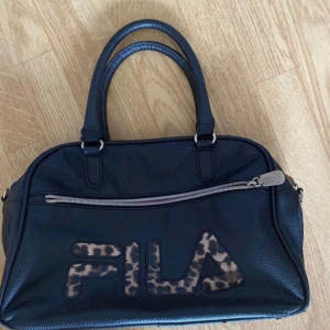 Väska  - En väska i använt skick 