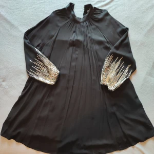 Festskjorta - Festskjorta med paljettärmar