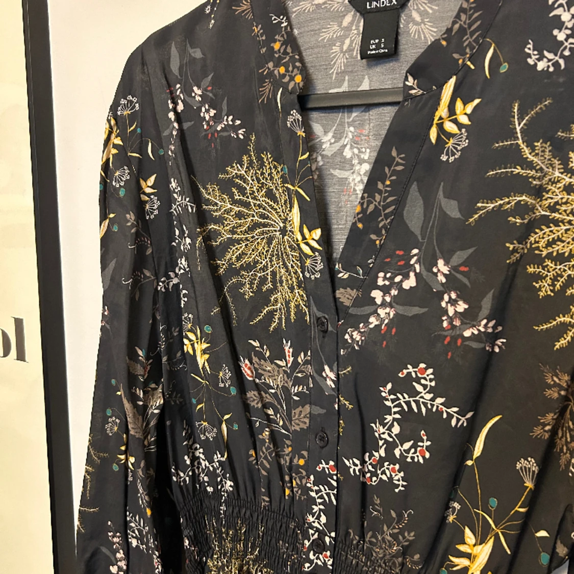 Blommig klänning från Lindex  - 90