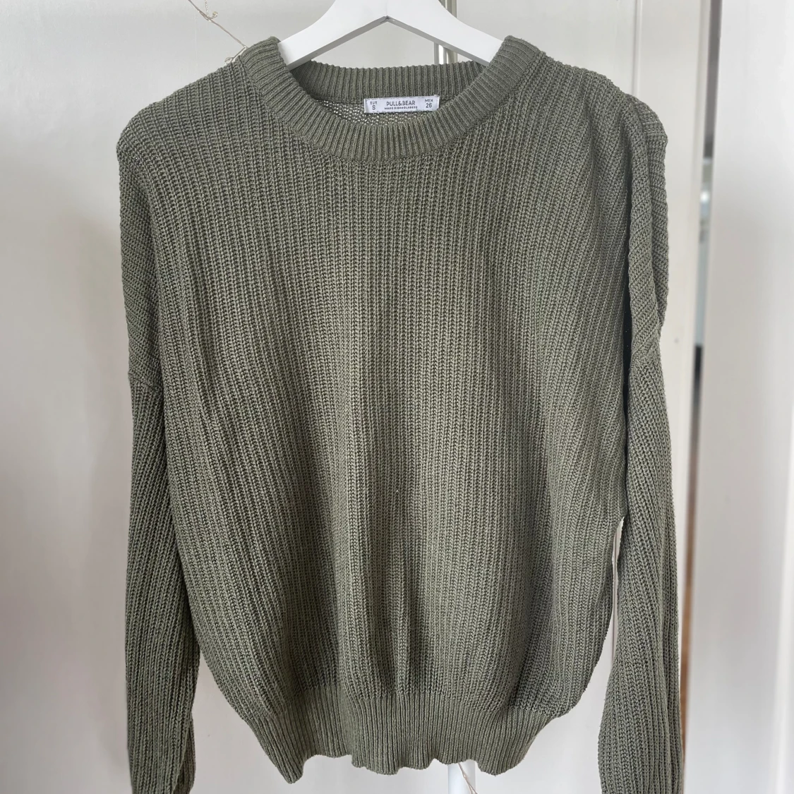 Grön stickad tröja