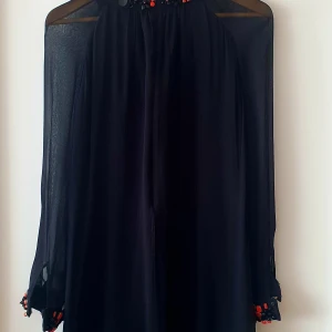 Cocktail mini dress - A stylish mini dress, black schifon. Worn 2 times only