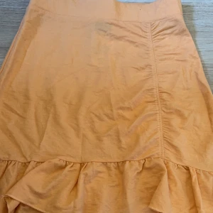 Kjol - Söt orange kjol.