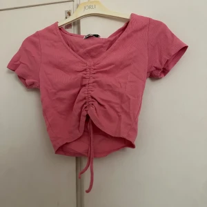 Rosa T-shirt - Använd 2 gng