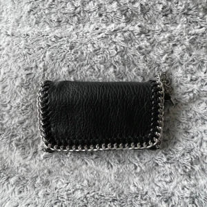 TIAMO väska  - Väska från scorett, köpt för 499. Storlek s. Använd några gånger, bra storlek med många fack. 