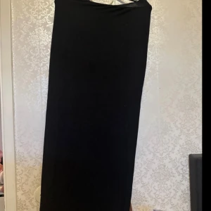 Svart kjol - Maxi kjol sol sitter tight