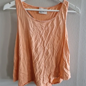 Linne - Aprikosfärgat Linne i storlek S.