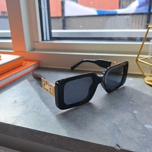 Solglasögon  - Aldrig använda 