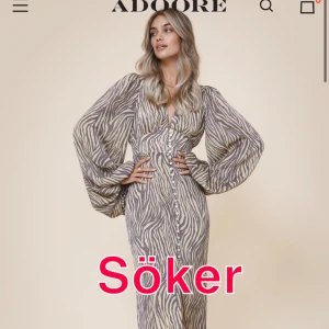 Söker Adoore Positano dress zebra strlk 40-42 - Söker!!!!