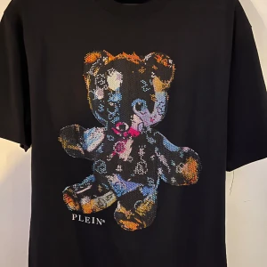 Philipp Plein t-shirt  - Pp t-shirt  Troligtvis kop1a Sitter som L/M