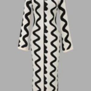 Stickad maxiklänning - Den här maxiklänningen har en ribbad halsringning. Maxiklänningen har ett stretchigt, stickat material.