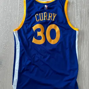 2016/17 Warriors NBA Curry Jersey. Size M 